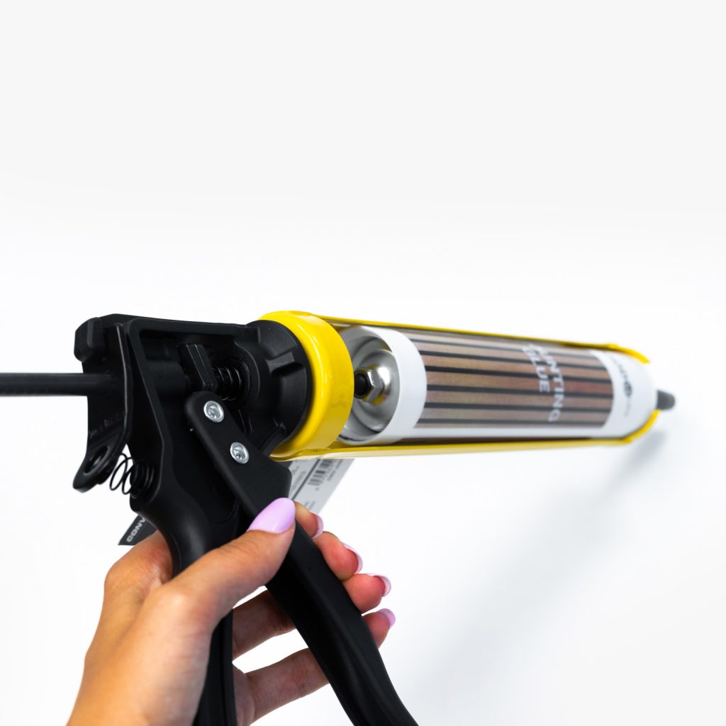 Grout gun product image with glue