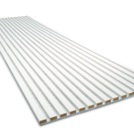 An angled perspective of a single WoodUpp Akupanel acoustic panel resting on a white surface. The panel features narrow white-painted slats mounted on a light grey acoustic felt backing, revealing the natural wood core along the edges of each slat.