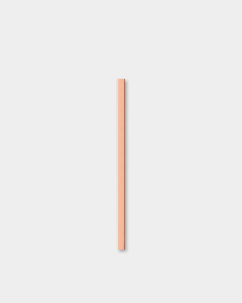 Centered on a white background, a single WoodUpp narrow rectangular wooden trim strip in a pale peach finish stands vertically. The smooth, square-edged slat shows fine grain, sharp corners and a soft drop shadow, suggesting a slim, lacquered profile suitable for edging or detailing.