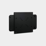 WoodUpp black VESA wall-mount bracket: a powder-coated steel square plate with multiple VESA hole patterns centered, flanked by two sliding side arms featuring four round rubber bumpers. Minimal matte finish, low-profile monitor/TV adapter designed by WoodUpp for secure, flush mounting.