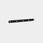 WoodUpp wall-mounted coat rack: a slim matte-black horizontal rail featuring five evenly spaced round brass pegs. Minimal, modern design with cylindrical golden hooks set into a rounded-edge black strip, ideal for hanging coats, bags, or towels while adding a refined contrast to interior walls.